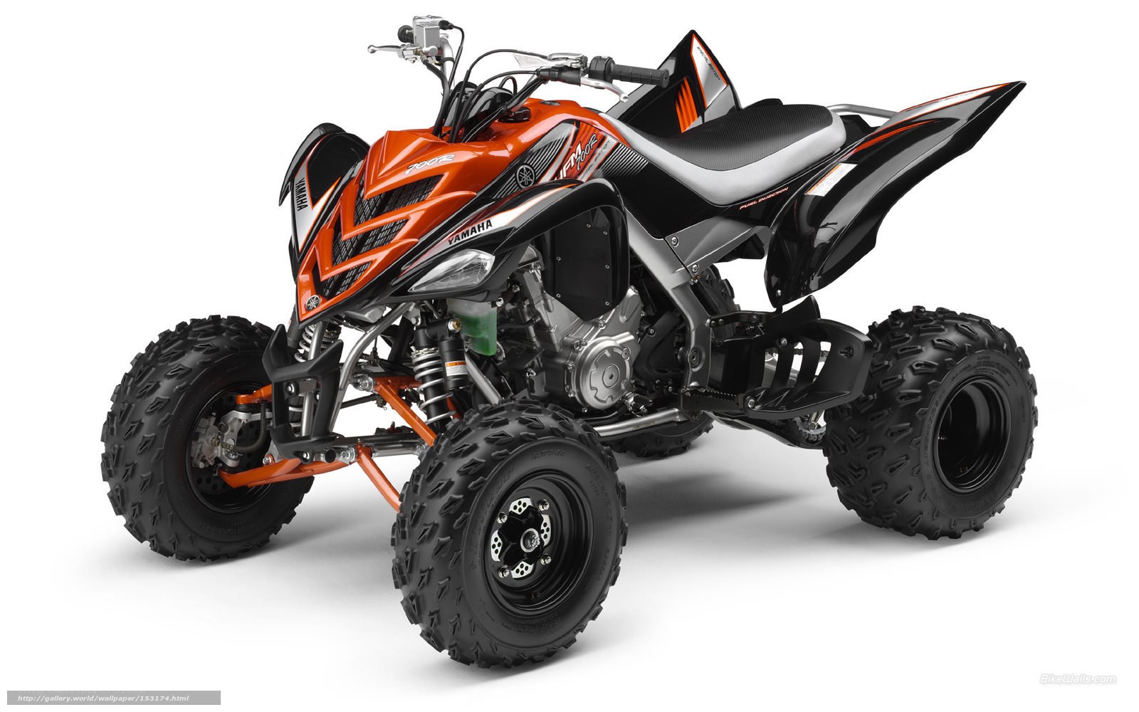 Orange and black Yamaha ATV