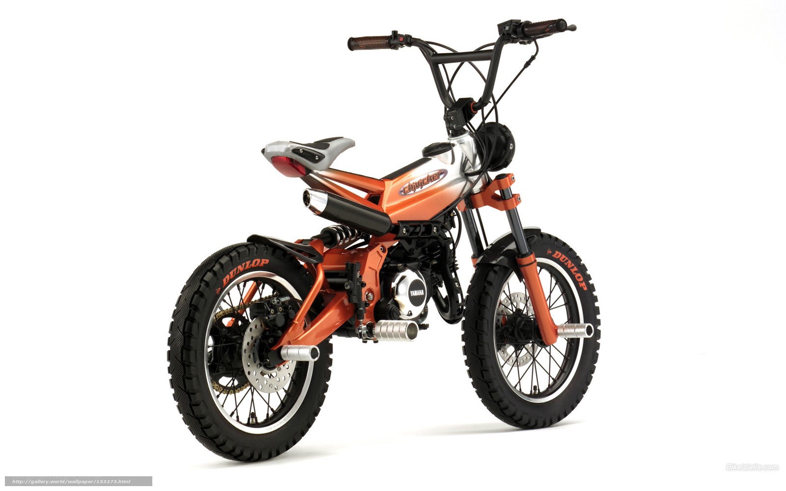 orange and silver dirt bike