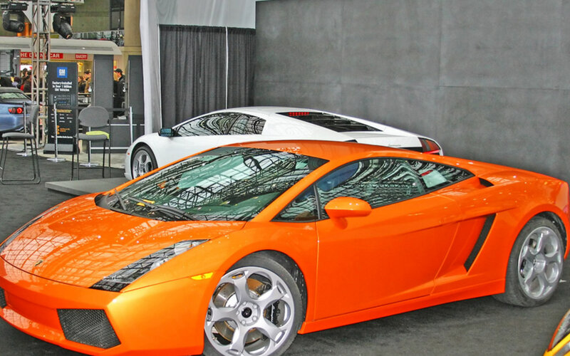 Orange and white Lamborghini sports cars