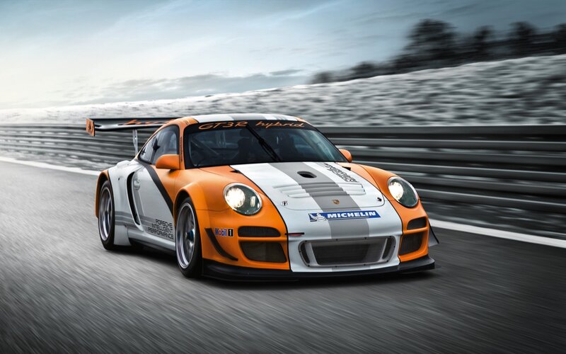 Orange and White Race Car — Dynamic, Photograph