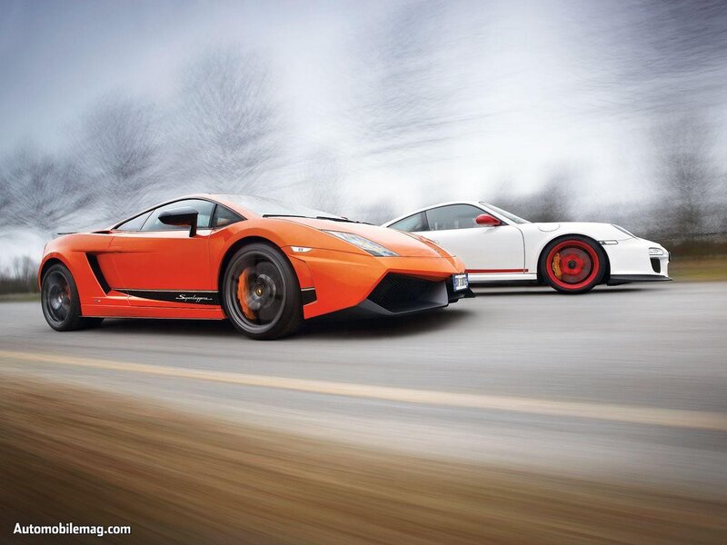 Orange and white sports cars racing