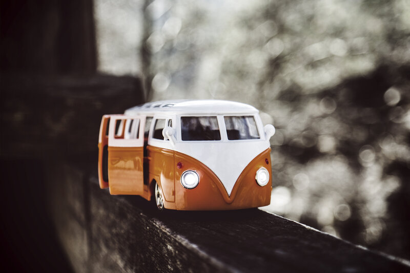 Orange and White Toy Van — Brown