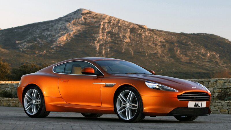 orange Aston Martin sports car