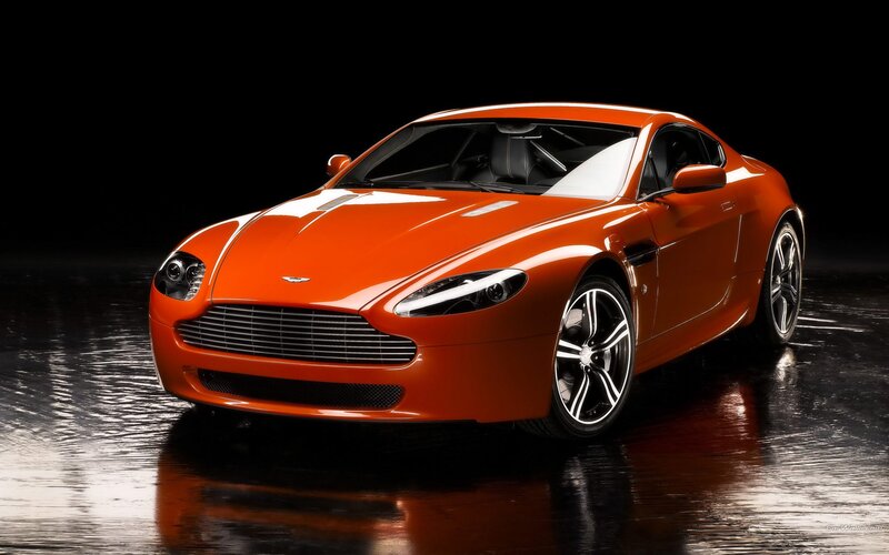 orange Aston Martin sports car