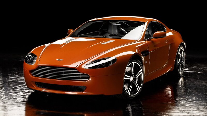 orange Aston Martin sports car