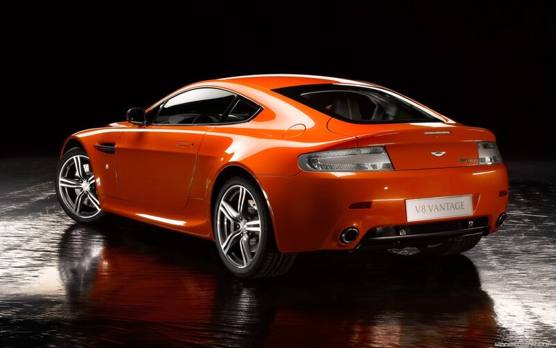 orange aston martin v8 vantage