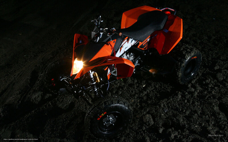 Orange ATV at night