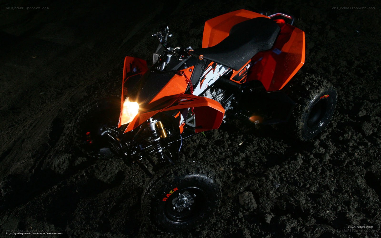 Orange ATV at night
