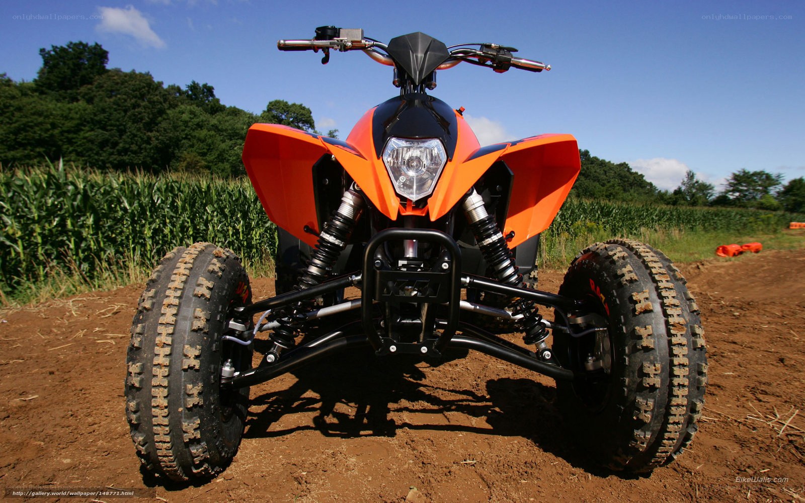 Orange ATV in a field