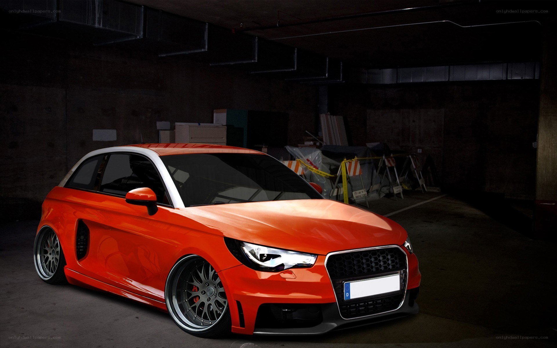 Orange Audi A1 in garage