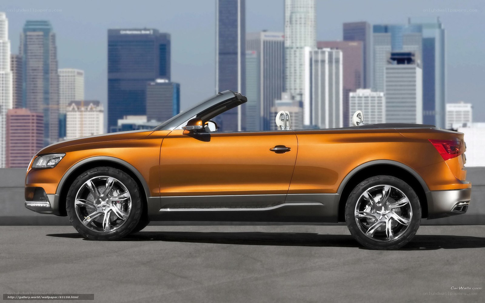 Orange Audi convertible in city
