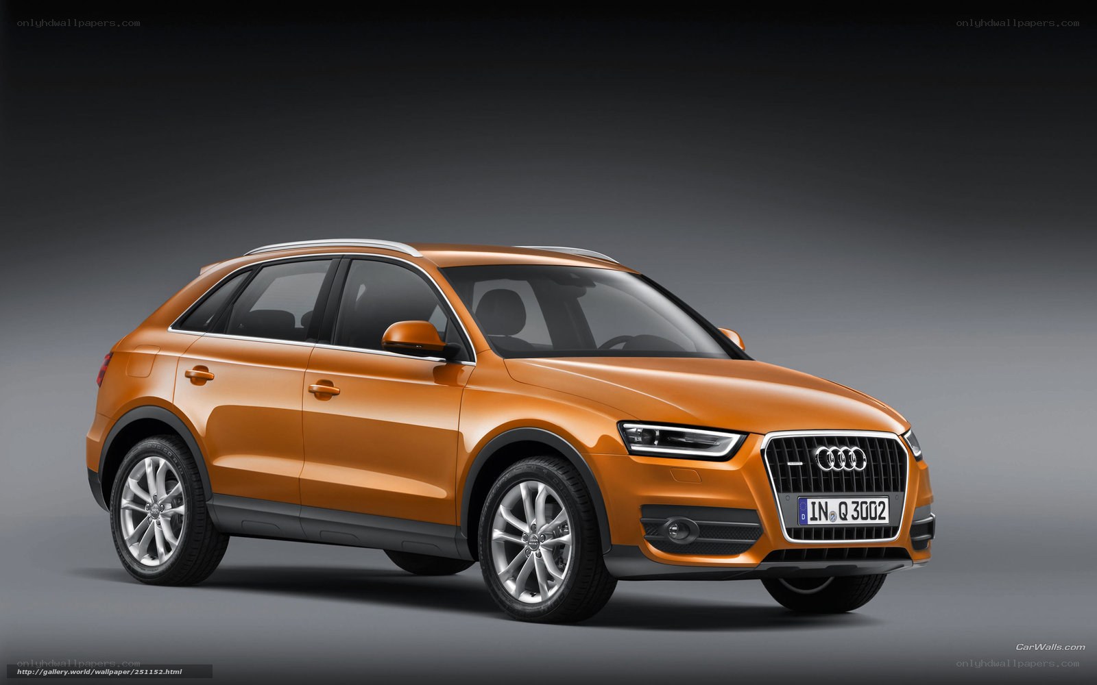 Orange Audi Q3 SUV