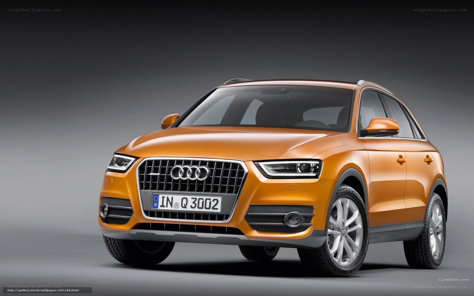 Orange Audi Q3 SUV