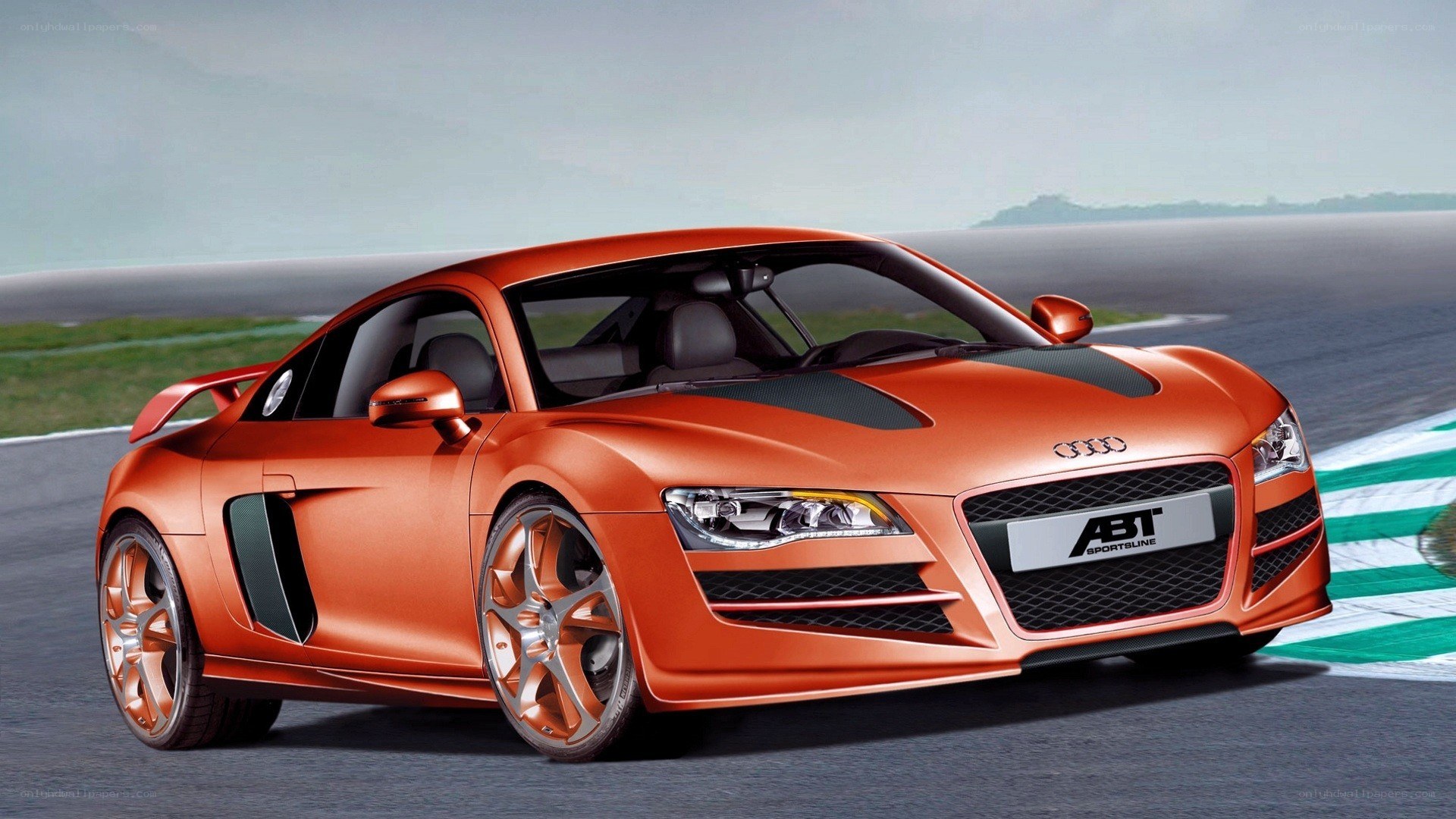 Orange Audi R8 on racetrack