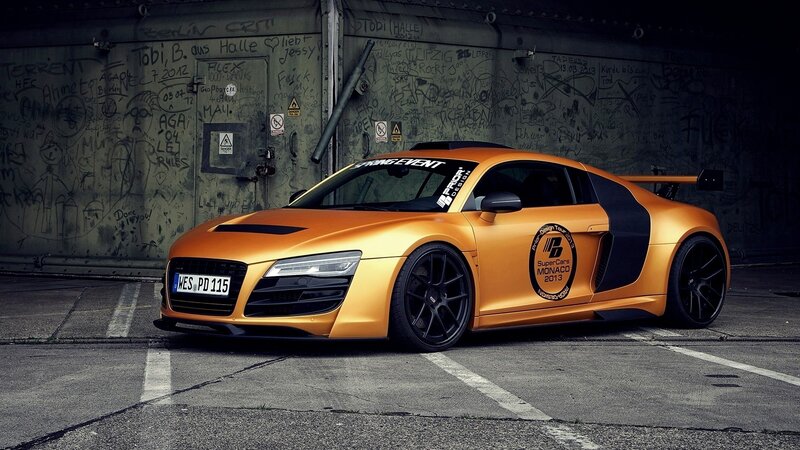Orange Audi R8 Sports Car — Dramatic, Photograph, Graffiti Wall, Black Wheels