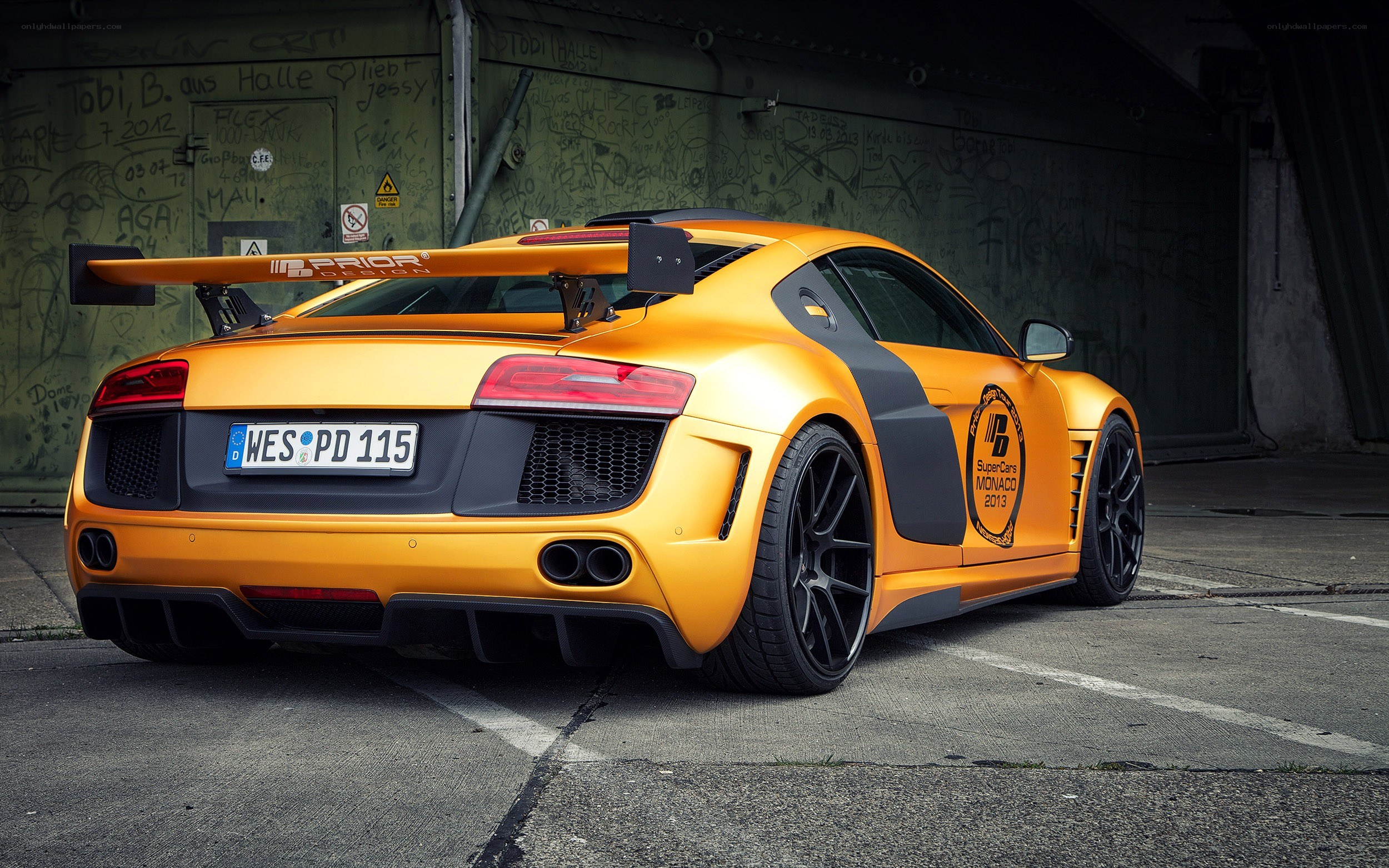 Orange Audi R8 with rear wing