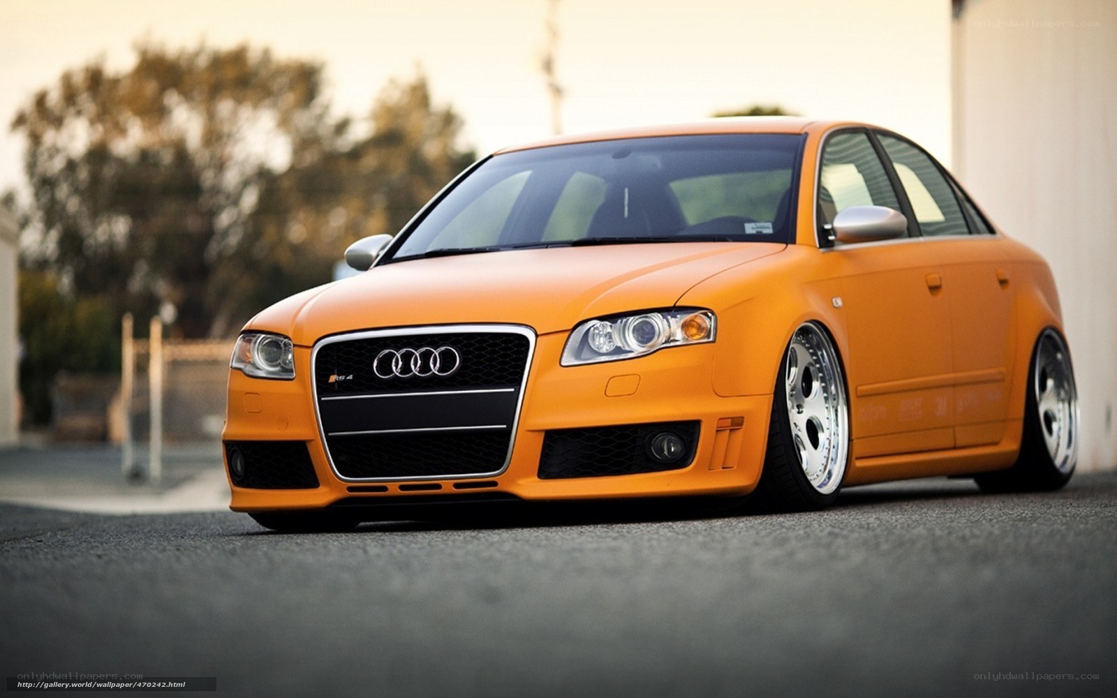 orange audi rs4 sedan