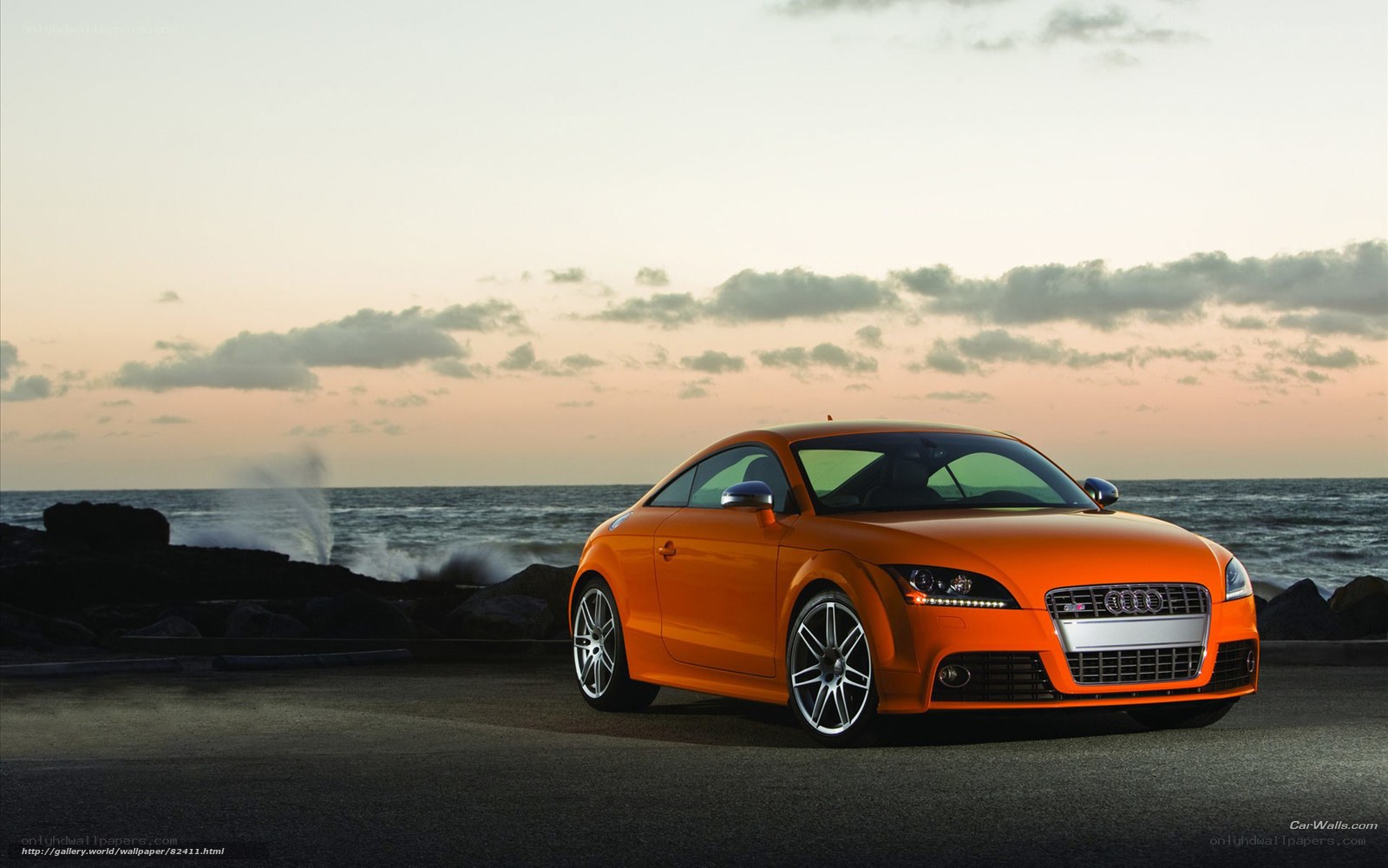 Orange Audi TT by the sea