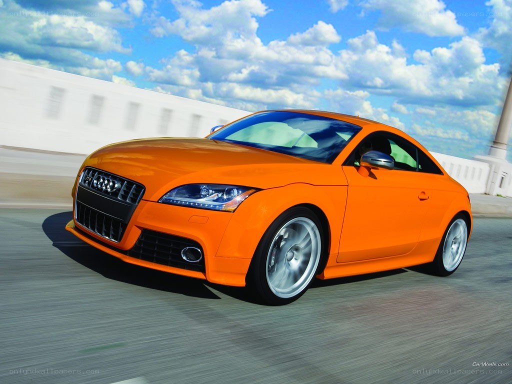 orange audi tt in motion