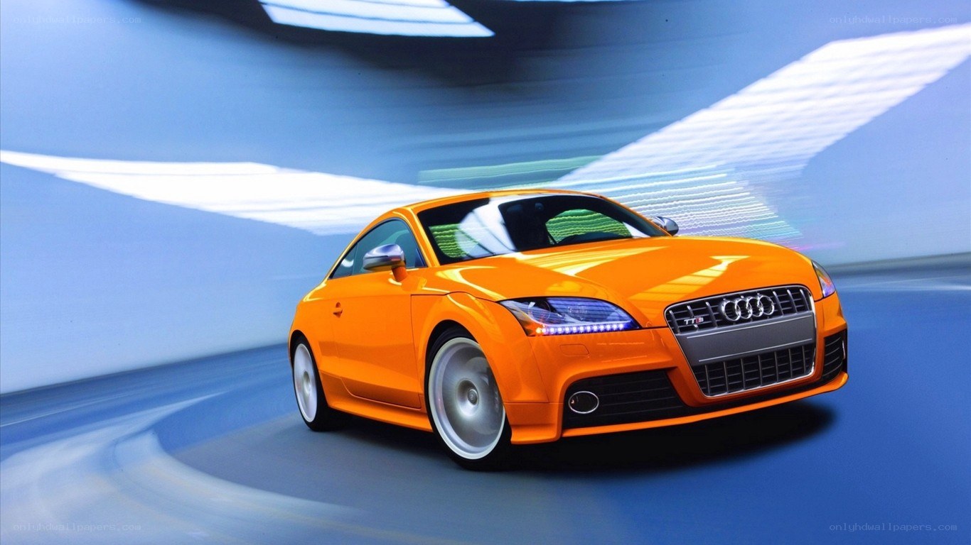 Orange Audi TT in motion
