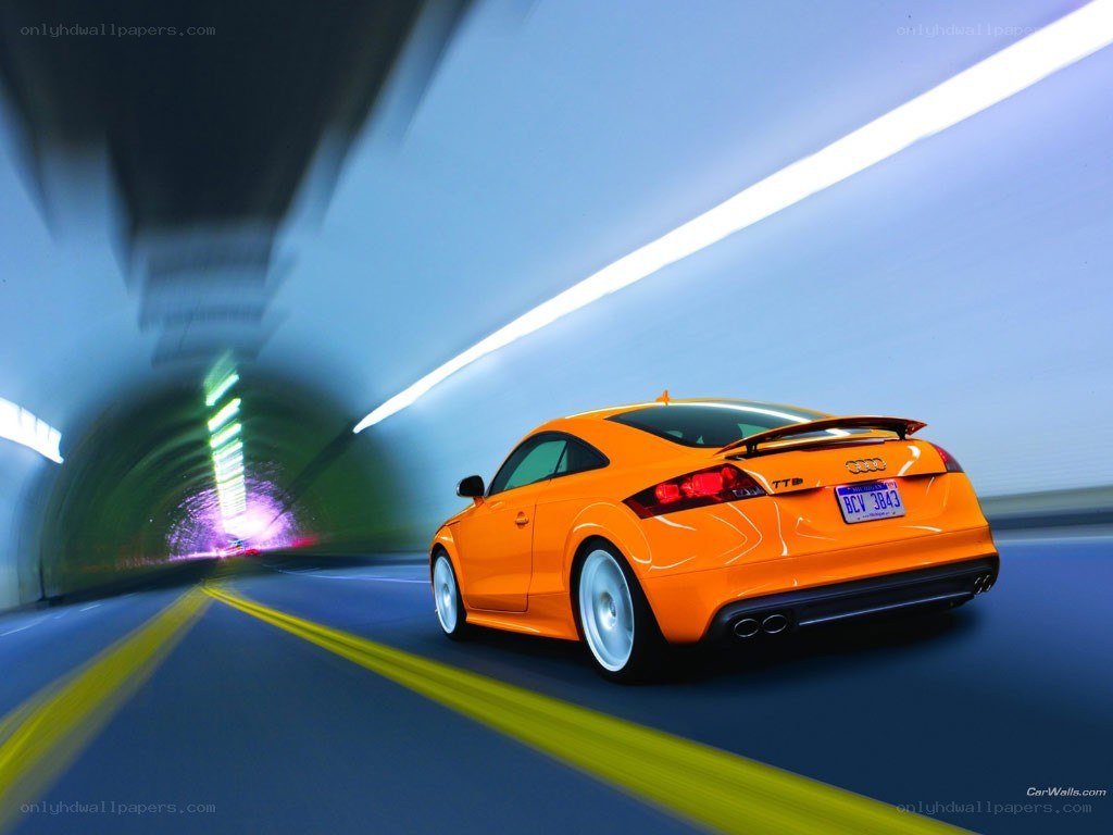 orange Audi TT in tunnel