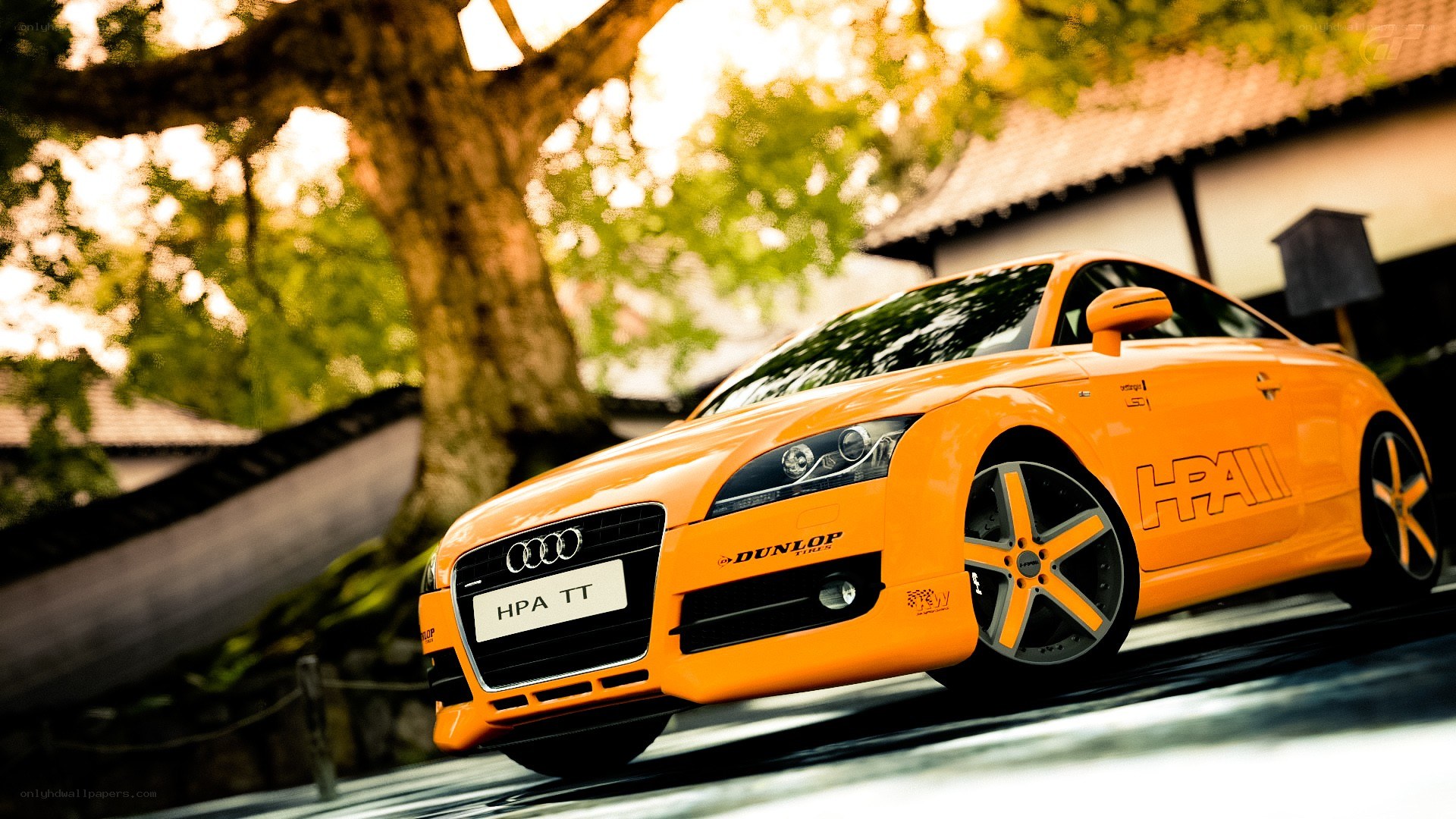 orange audi tt on a road