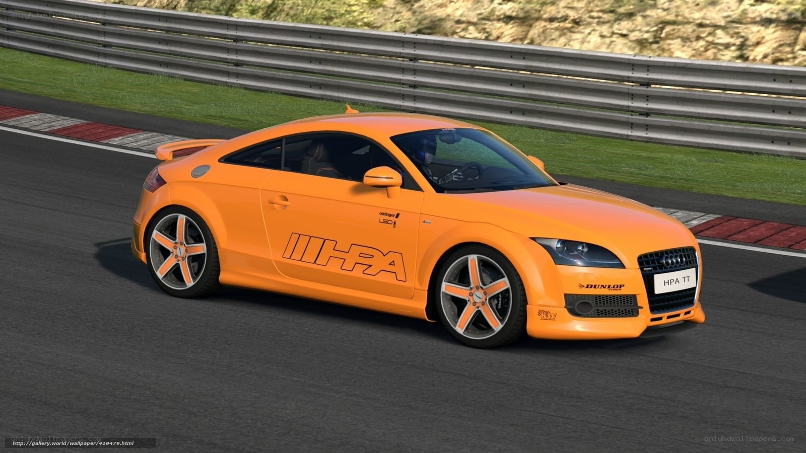 Orange Audi TT on racetrack