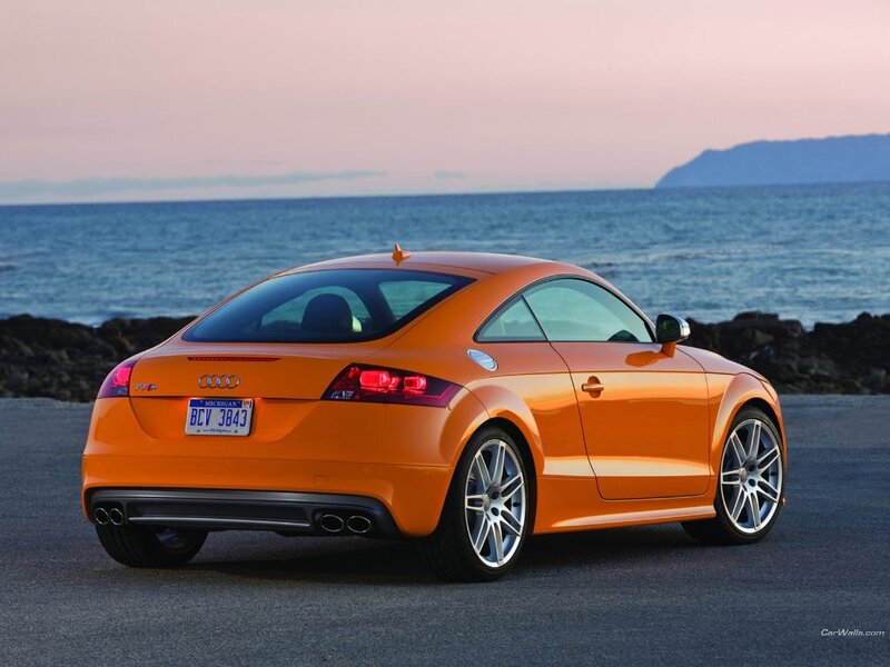 Orange Audi TT-RS by the sea