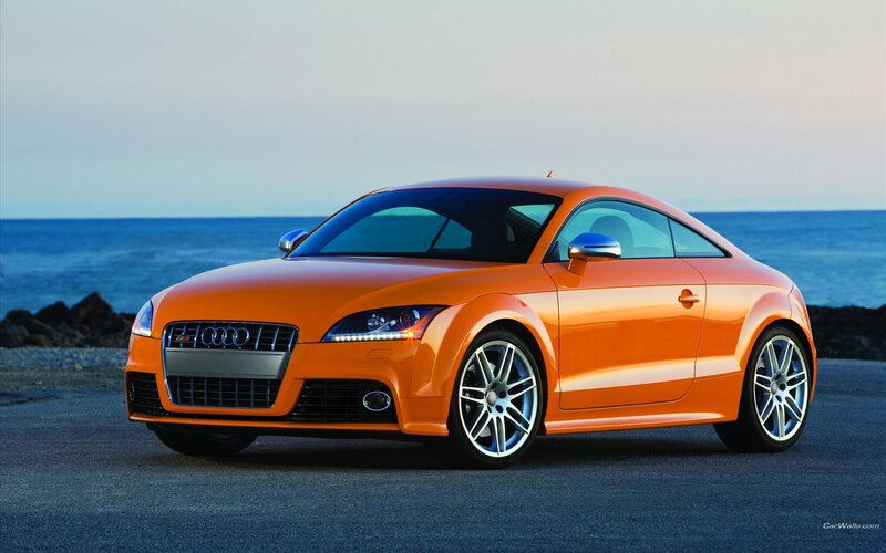 Orange Audi TT-RS by the sea