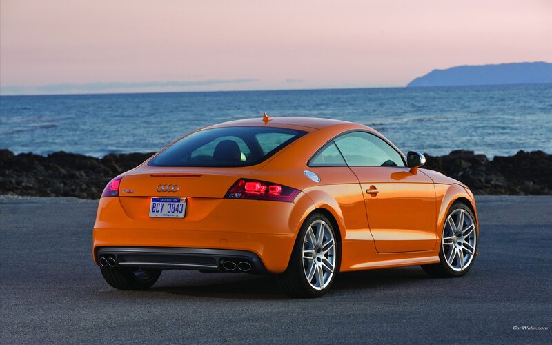 Orange Audi TT-RS by the sea