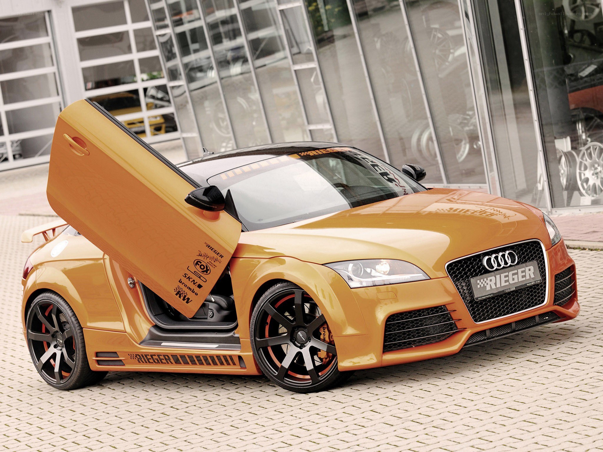 Orange Audi TT with open door