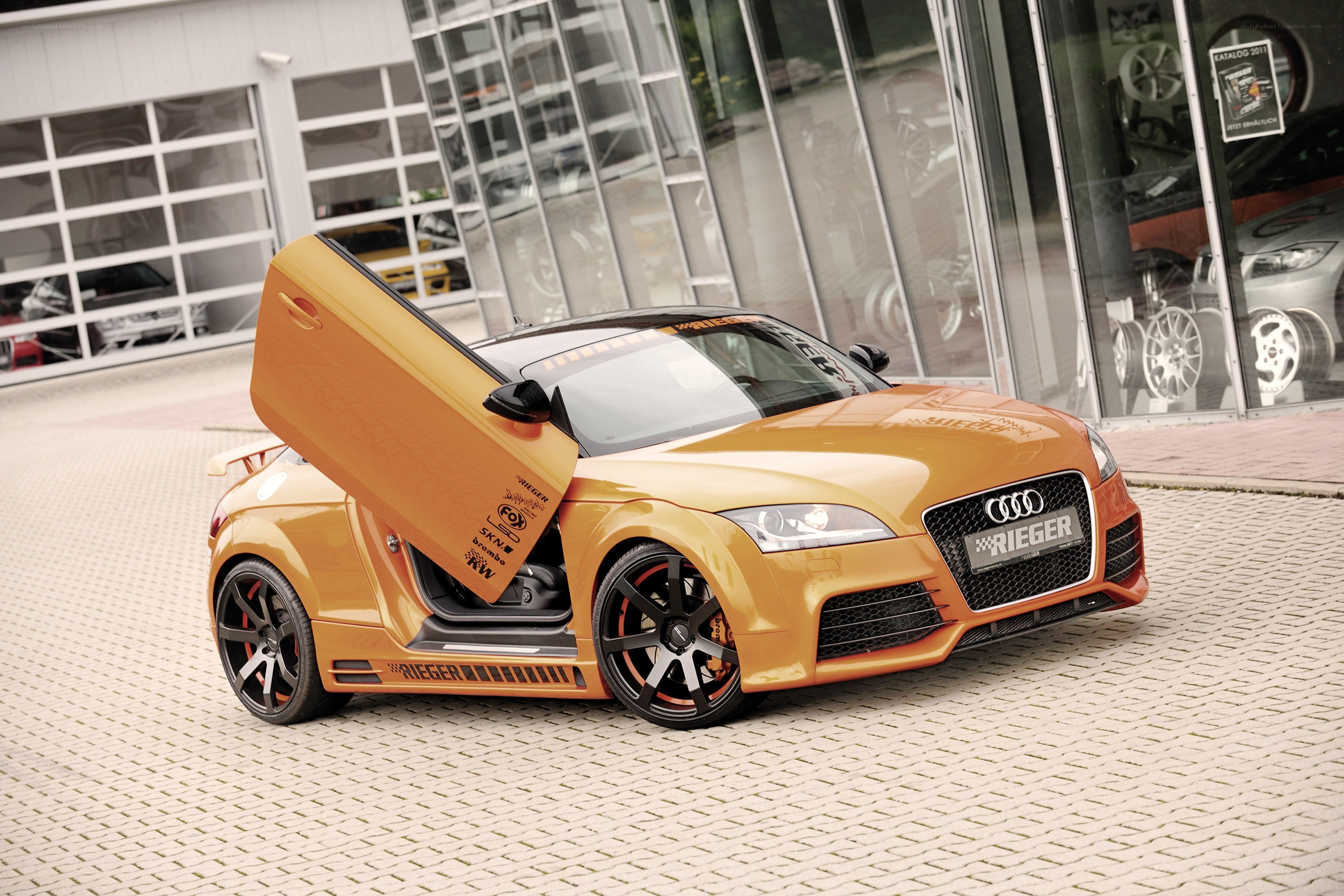 Orange Audi TT with open door
