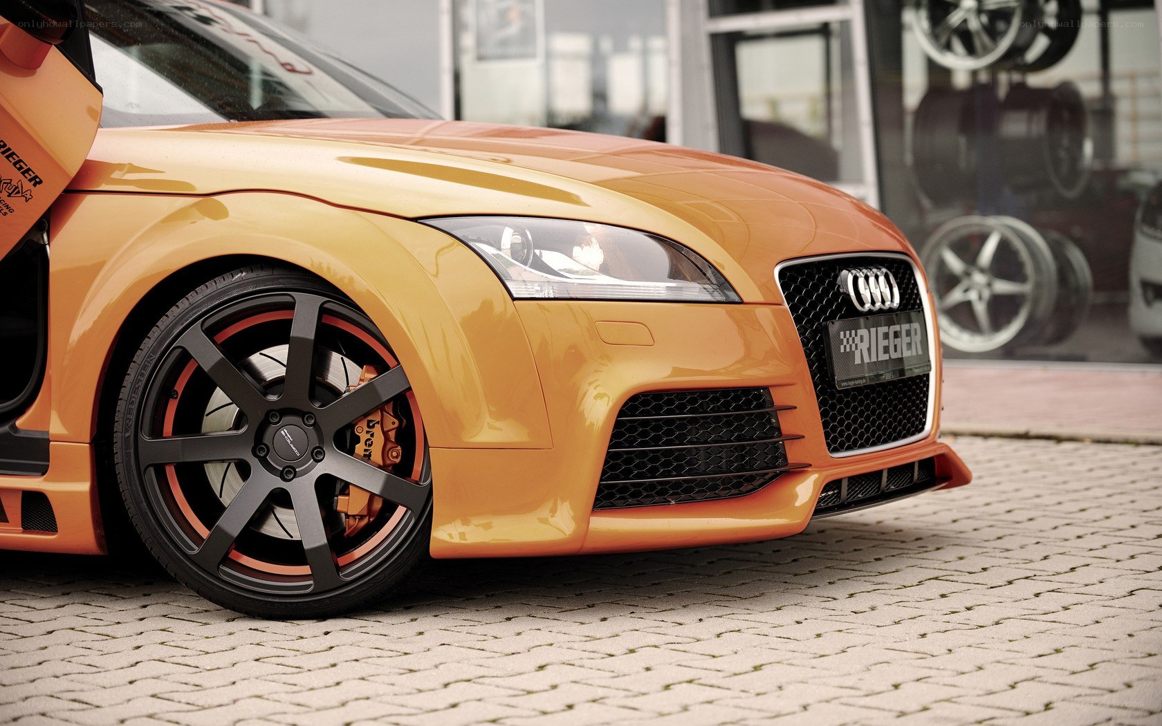 Orange Audi TT with Rieger modifications