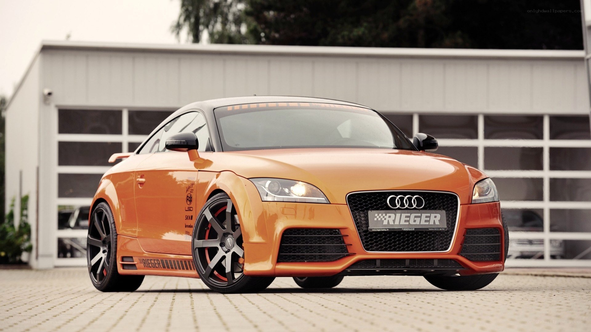 Orange Audi TT with Rieger modifications