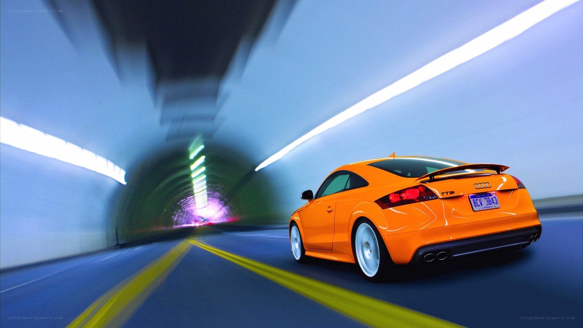 Orange Audi TTS in tunnel