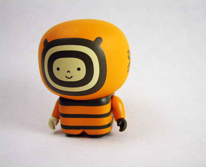 orange bee-like figurine