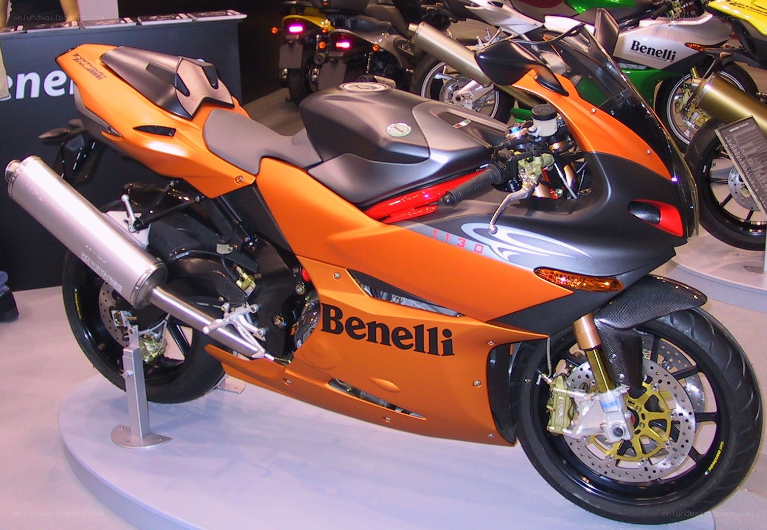 Orange Benelli motorcycle on display
