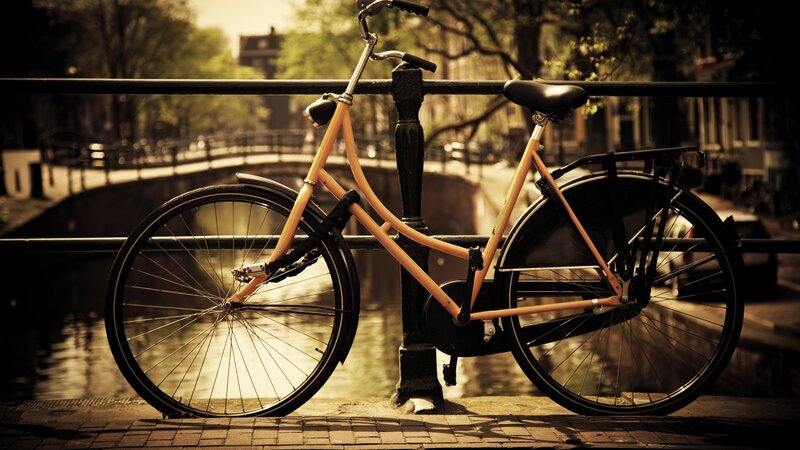 Orange Bicycle on Bridge — Yellow