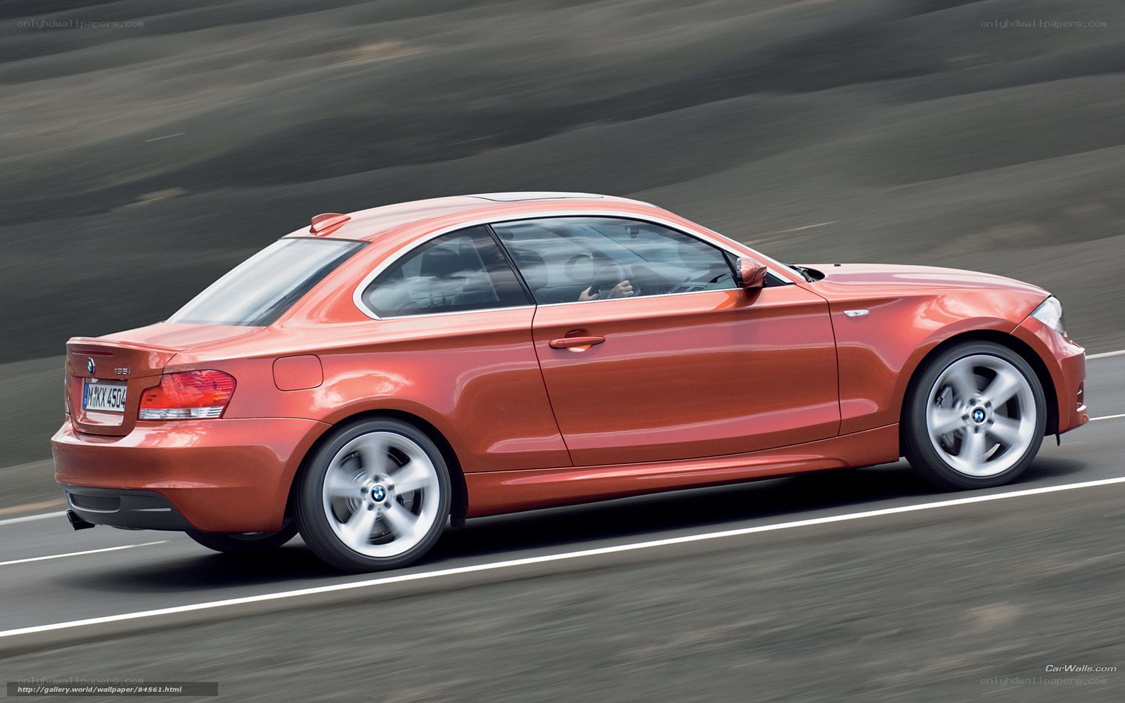 orange BMW 1-Series Coupe