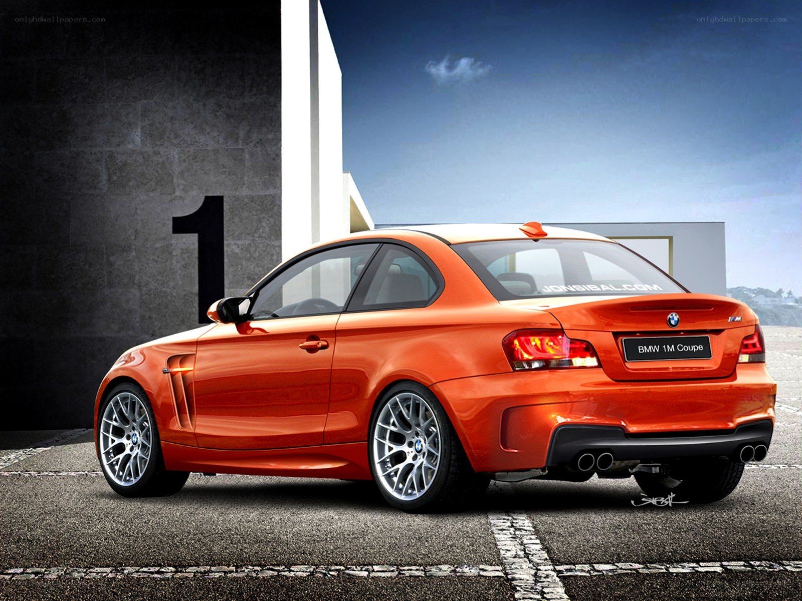 Orange BMW 1M Coupe