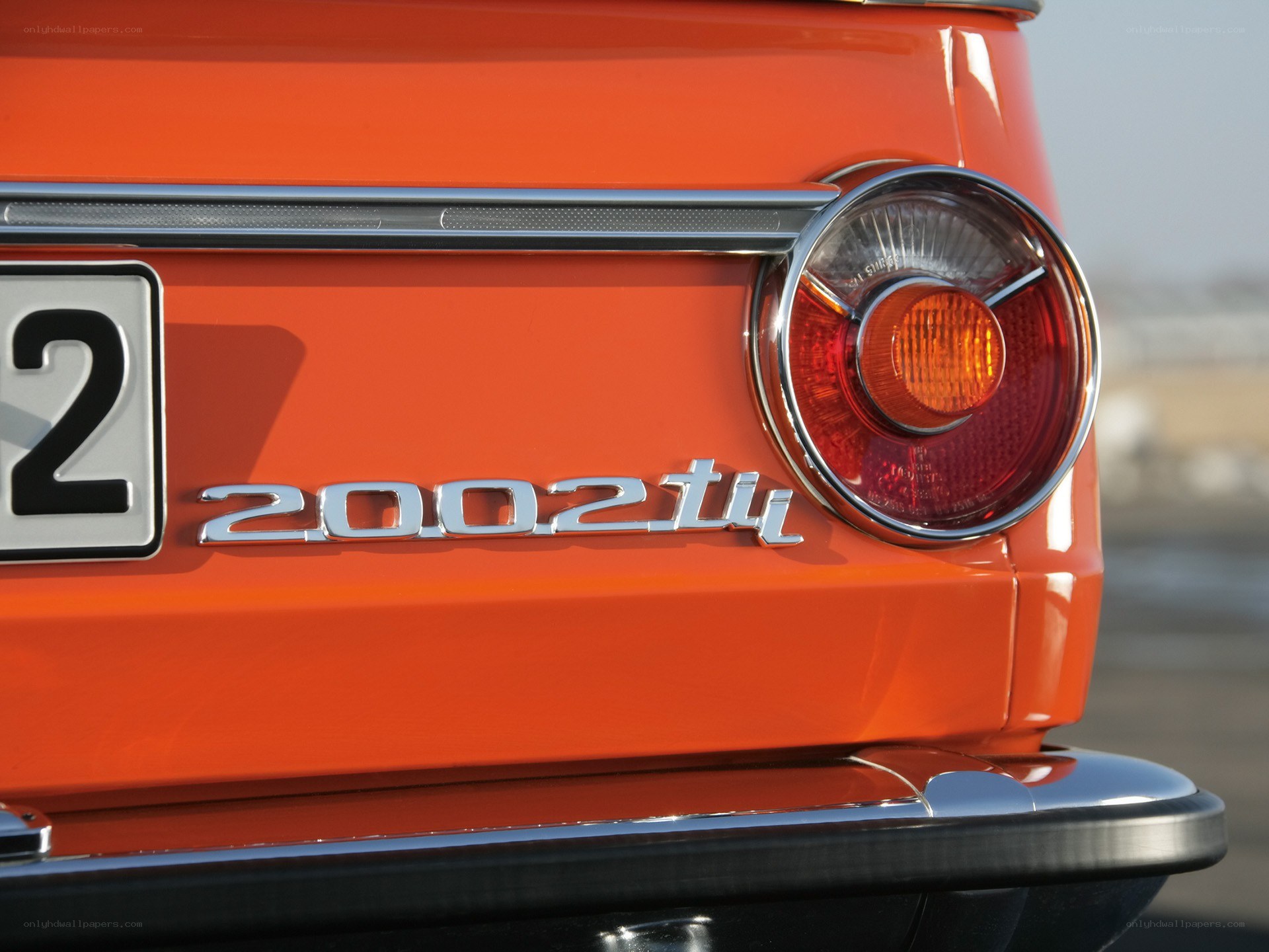 orange bmw 2002ti rear