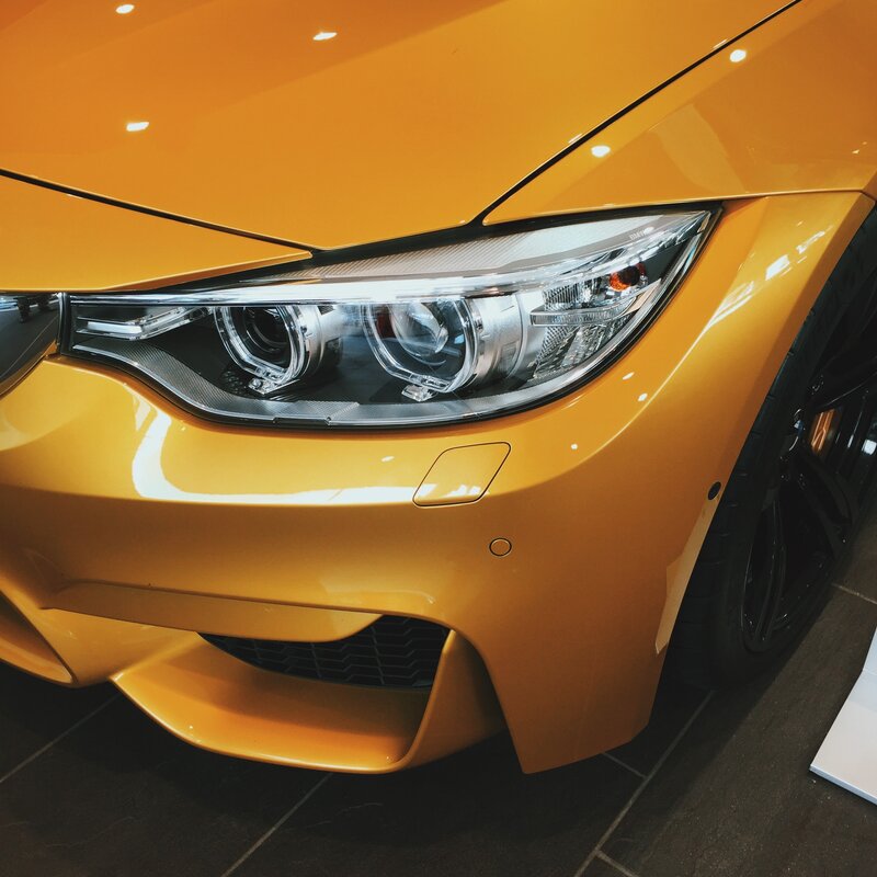 Orange BMW Car — Yellow