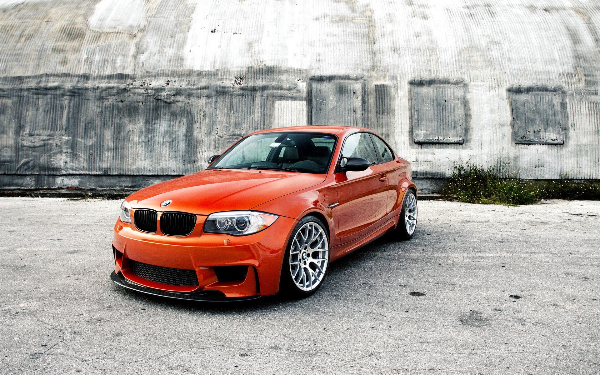Orange BMW coupe parked