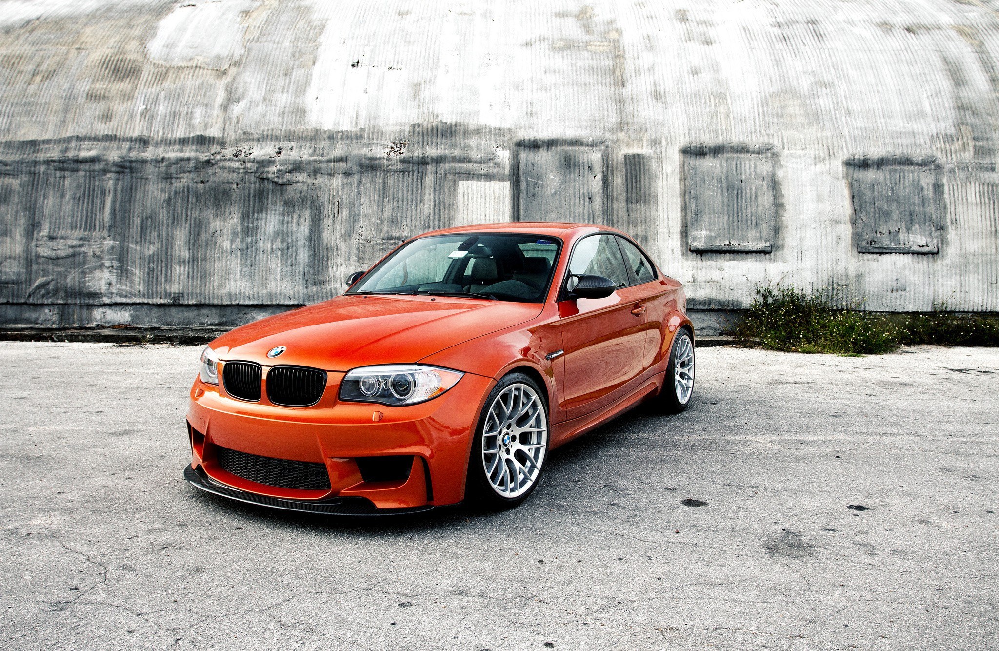 Orange BMW coupe parked