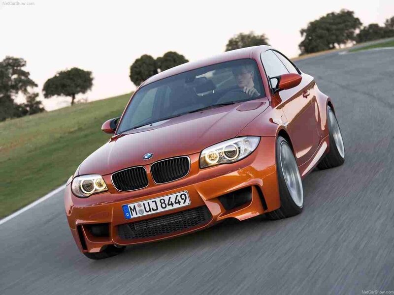 Orange BMW M1 Car — Dynamic, Sunset, Photograph, Driver