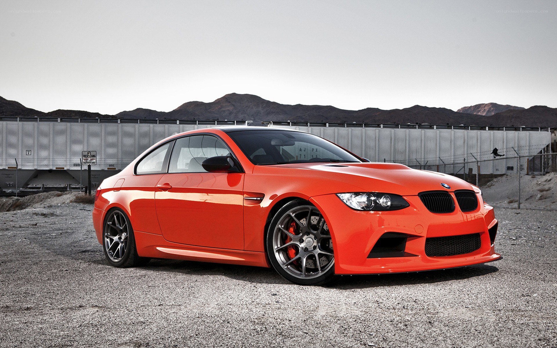 orange BMW M3 coupe