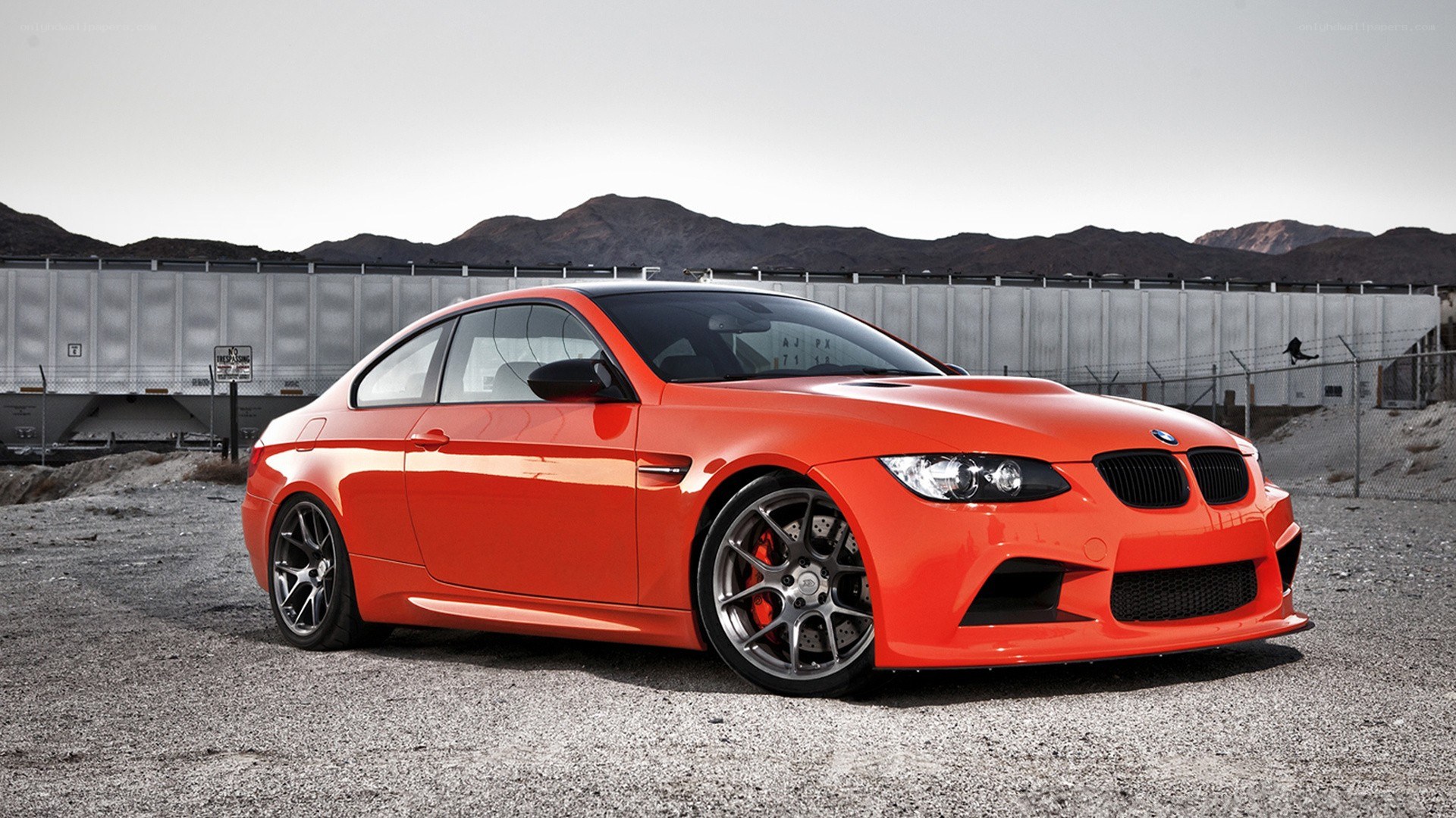 orange BMW M3 coupe
