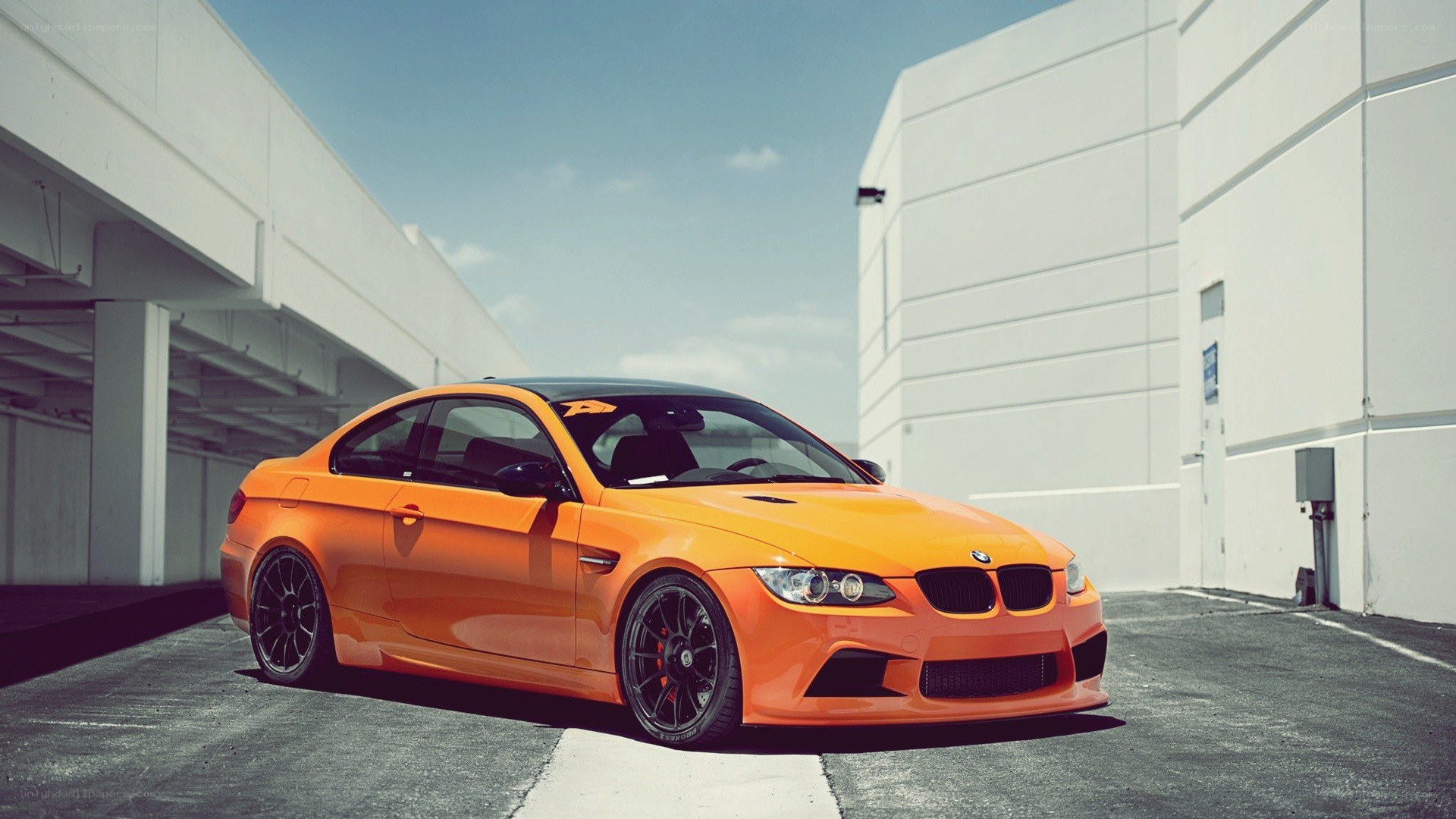 orange BMW M3 coupe