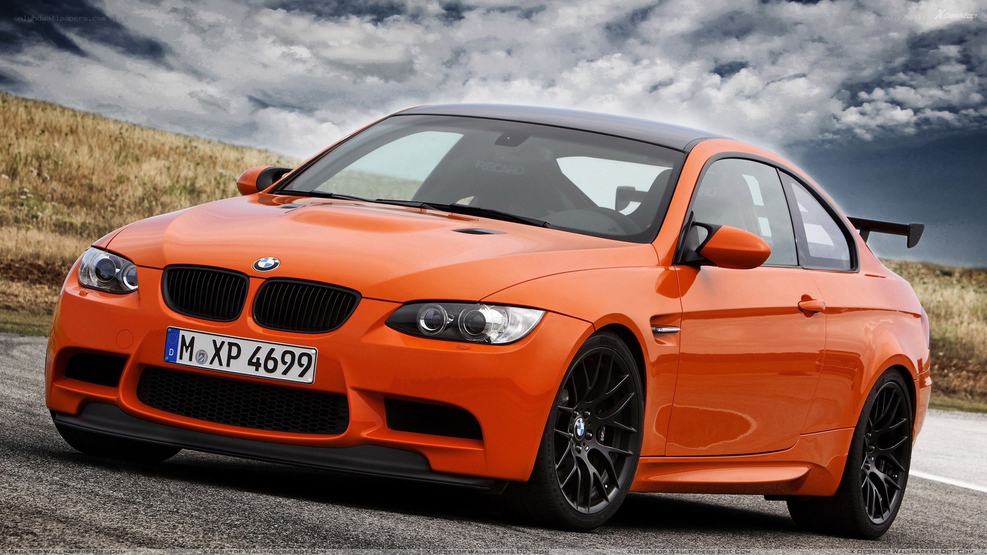 orange BMW M3 coupe