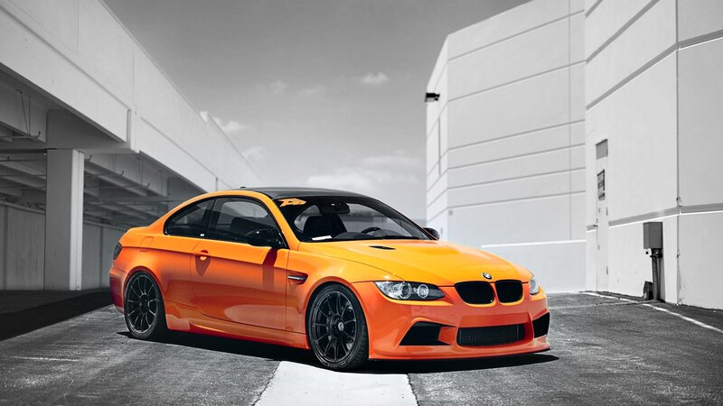 Orange BMW M3 Coupe — Dramatic, Afternoon, Photograph, Car, Building, Parking Garage